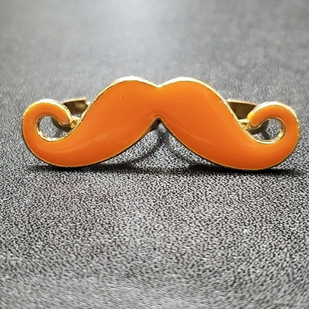 Gold tone orange mustache double ring